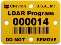A yellow Chevron LDAR program tag with a number, a barcode and “Do not remove”.
