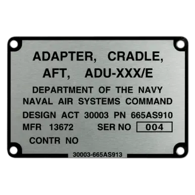 A metal U.S. Navy equipment identification plate with part and serial numbers.