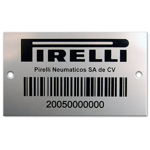 A brushed metal Pirelli nameplate with a barcode and serial number.