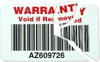 A “Warranty void if removed” label, torn where somebody tried to peel it off.